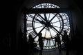 People are silhouettes with the clock at Orsay Museum (MusÃ©e d'Orsay), Paris